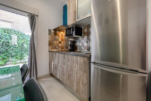 Fridge, microwave, coffee/tea maker, toaster