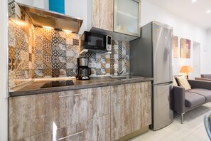 Fridge, microwave, coffee/tea maker, toaster