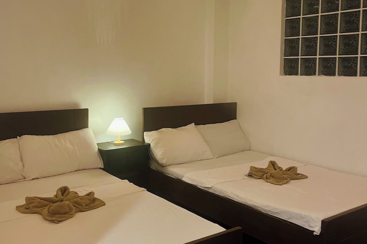 Deluxe Quadruple Room, Garden View | Laptop workspace, free WiFi