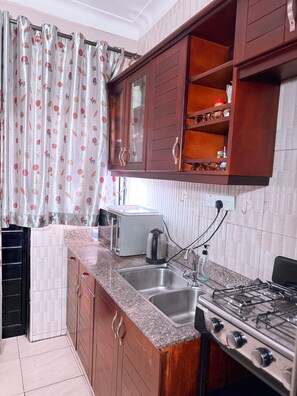 Deluxe Studio, Balcony, City View | Private kitchen