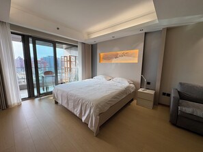 Deluxe King Room (with Balcony View) | Individually decorated, desk, laptop workspace, blackout curtains