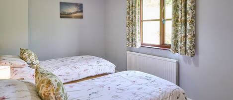 2 habitaciones, tabla de planchar con plancha, cuna de viaje y wifi