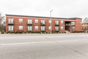 A red brick building with multiple windows and a sign reading "2nd St. Lofts". - Loft #105 (540 N 2nd St) (Clarksville)