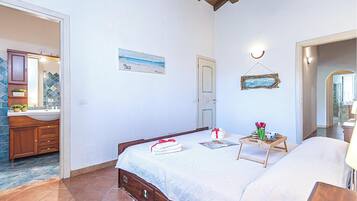 Family Villa, 4 Bedrooms, Fireplace, Mountainside (Villa La Licciola) | 4 bedrooms, laptop workspace, iron/ironing board, free WiFi