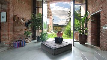 Villa, Garden View | Living area | 32-inch flat-screen TV with digital channels