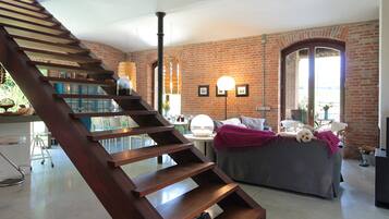 Villa, Garden View | Living area | 32-inch flat-screen TV with digital channels