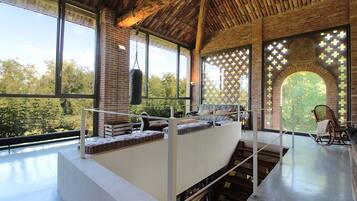 Villa, Garden View | Living area | 32-inch flat-screen TV with digital channels