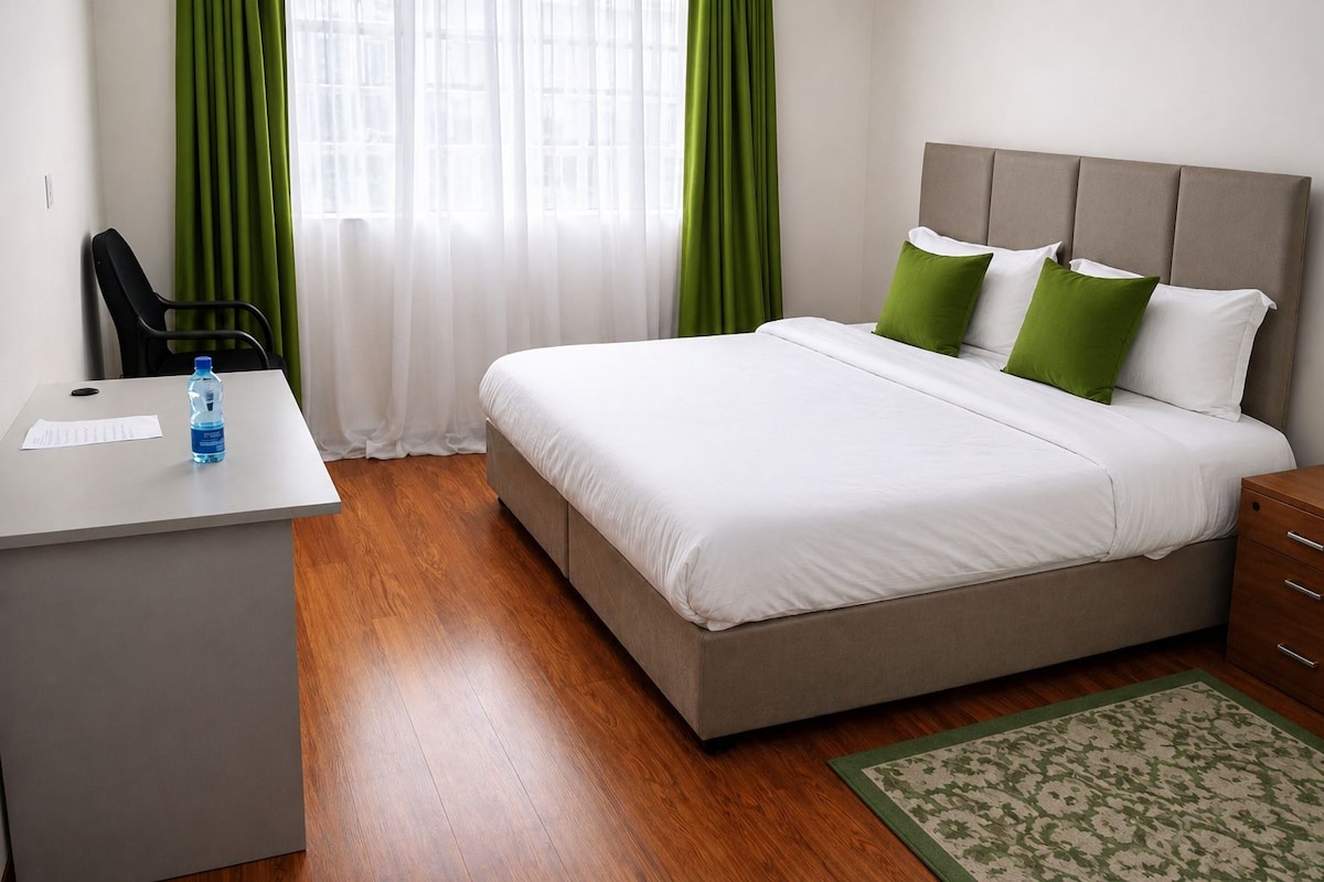 Habitación Confort con 1 cama matrimonial o 2 individuales, balcón, vista al jardín | Caja de seguridad en la habitación y escritorio 
