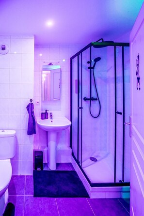 Shower, hair dryer, towels, soap
