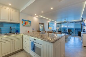 Condo, 2 Bedrooms | Private kitchen | Fridge, oven, coffee/tea maker, toaster