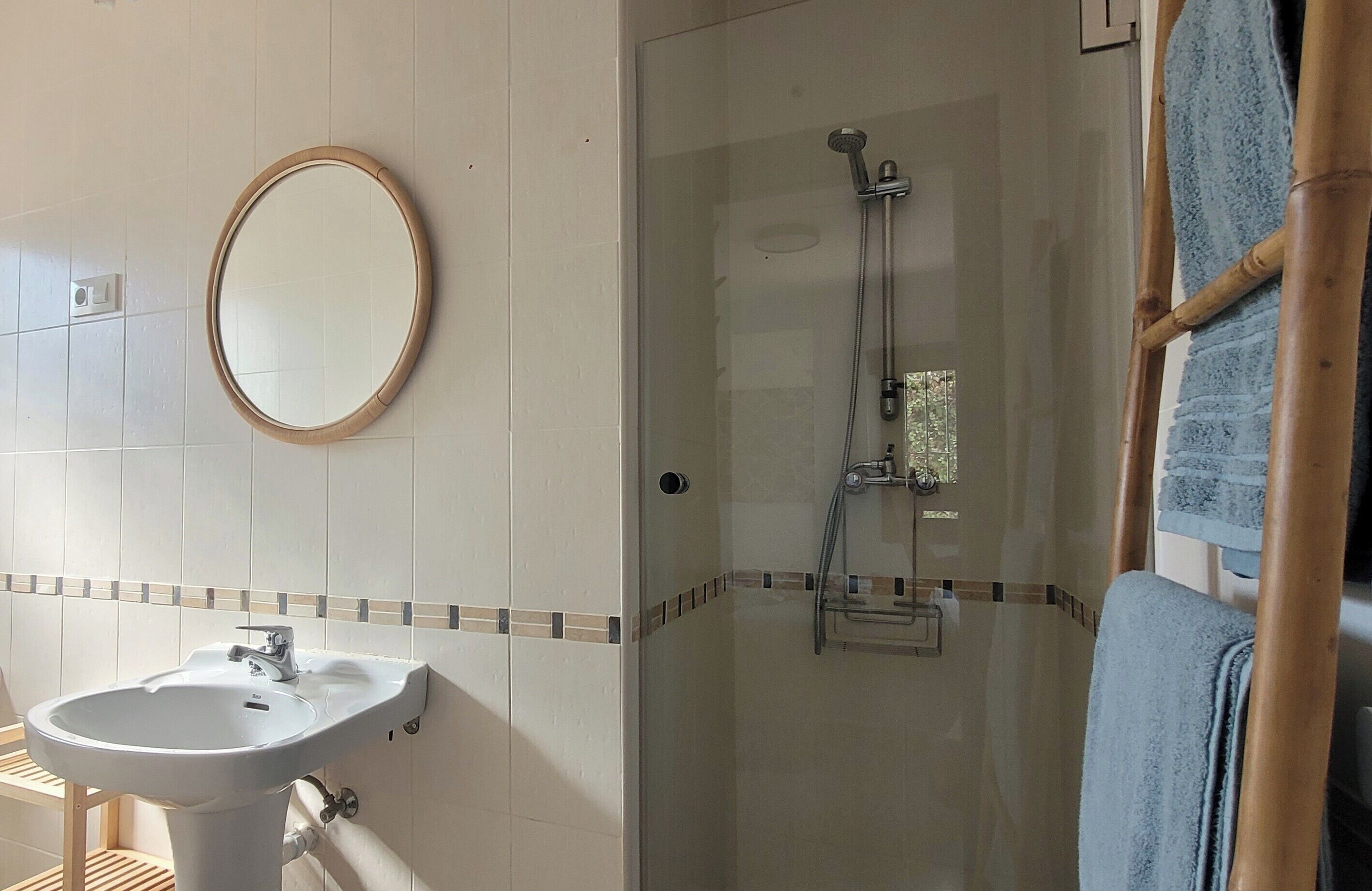 Combined shower/bathtub, deep-soaking bathtub, hair dryer, towels