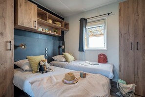 2 habitaciones y ropa de cama