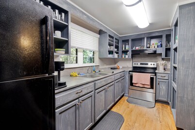 Downtown three bedroom house with game room and outside lounge area.