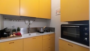 Apartment (2 Bedrooms) | Private kitchen | Espresso maker, electric kettle, high chair