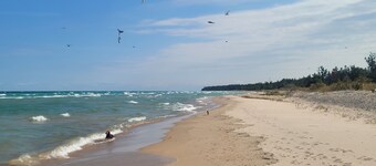 A Frame cabin with a short stroll to a gorgeous sandy beach!