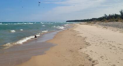 A Frame cabin with a short stroll to a gorgeous sandy beach!