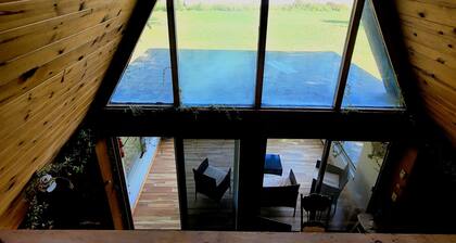 A Frame cabin with a short stroll to a gorgeous sandy beach!