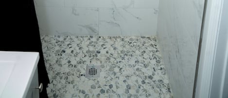 Shower, towels, soap, shampoo