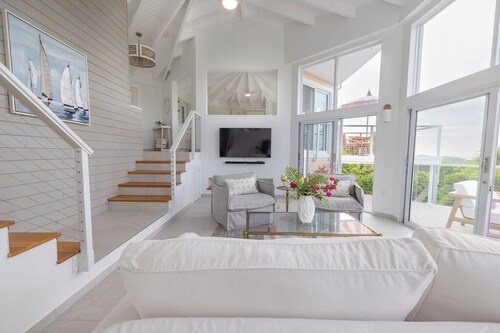 The Pink Nest a newly renovated 2BD, 2BA home with ocean views & chef's kitchen.