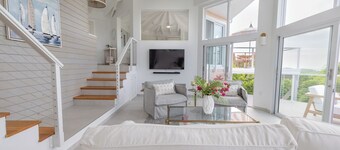 The Pink Nest a newly renovated 2BD, 2BA home with ocean views & chef's kitchen.