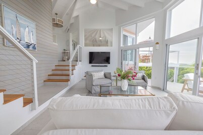 The Pink Nest a newly renovated 2BD, 2BA home with ocean views & chef's kitchen.