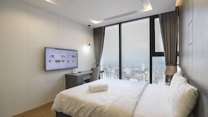 Deluxe Double Room Single Use, City View | In-room safe, desk, laptop workspace, blackout drapes