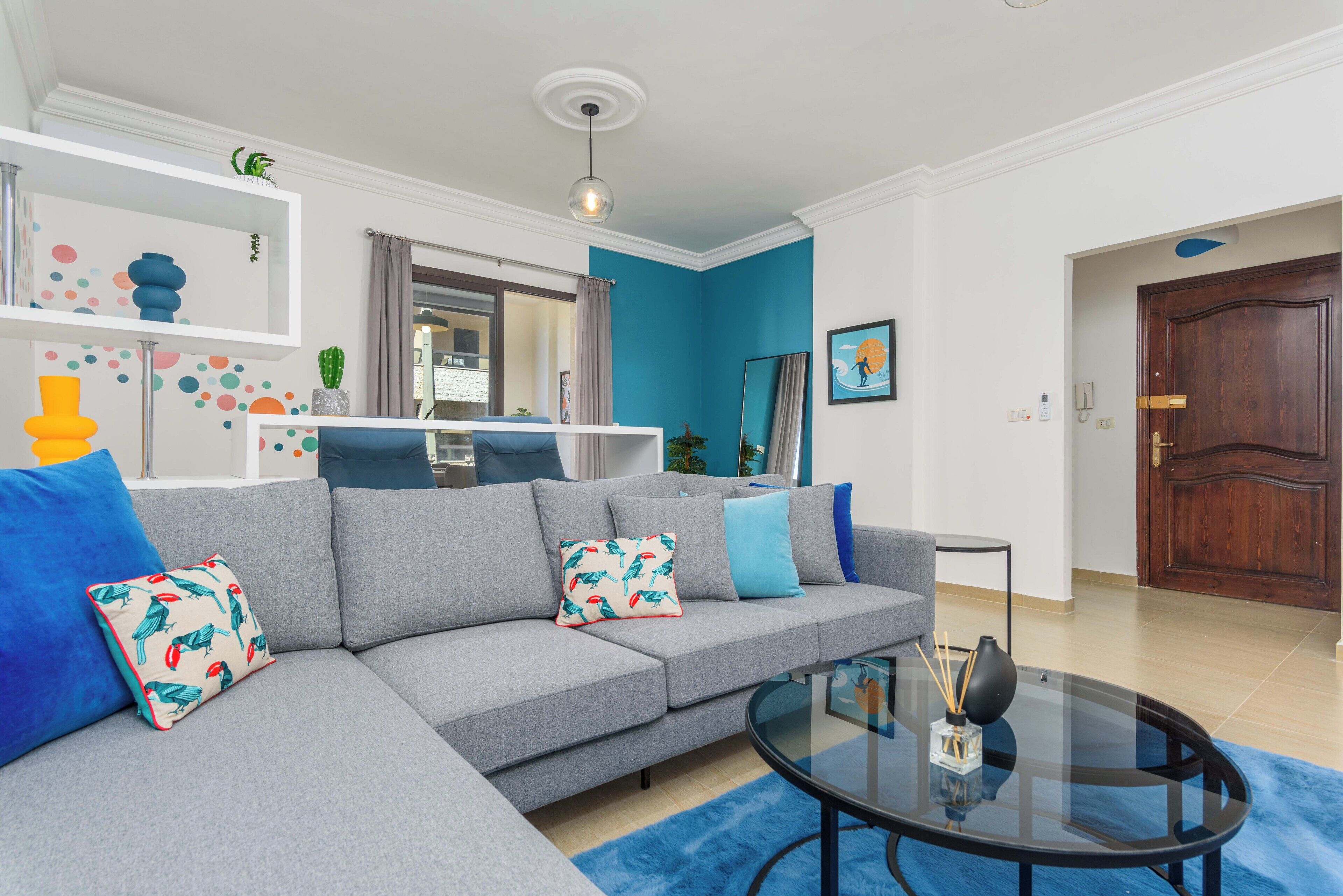 Apartment, 2 Bedrooms, Kitchen, City View | Living room | 50-inch Smart TV with cable channels, streaming services