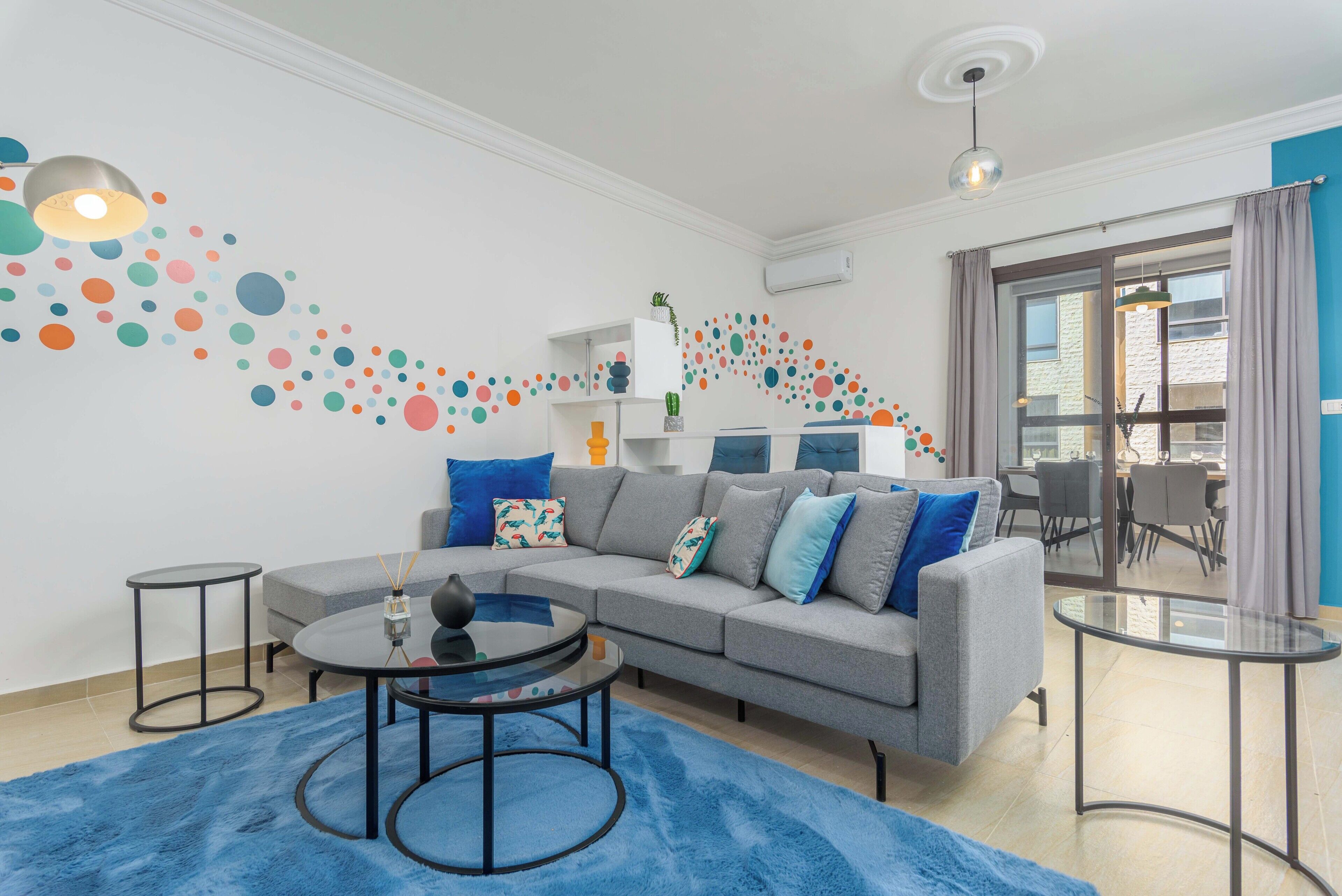 Apartment, 2 Bedrooms, Kitchen, City View | Living room | 50-inch Smart TV with cable channels, streaming services