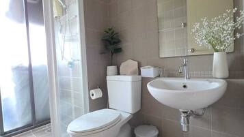 Hair dryer, towels, soap, toilet paper