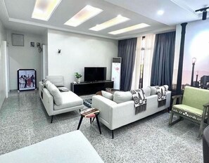 Comfort Apartment, Balcony, City View | Living area - Chidexluxury Shortlet  (Abuja)
