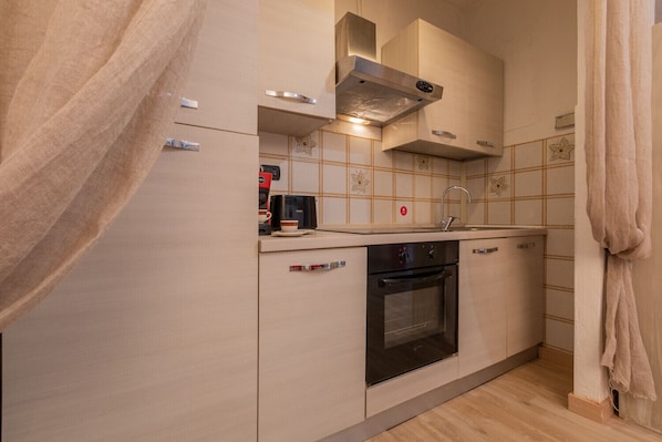 Fridge, oven, electric kettle, toaster
