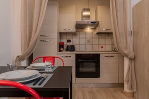 Fridge, oven, electric kettle, toaster