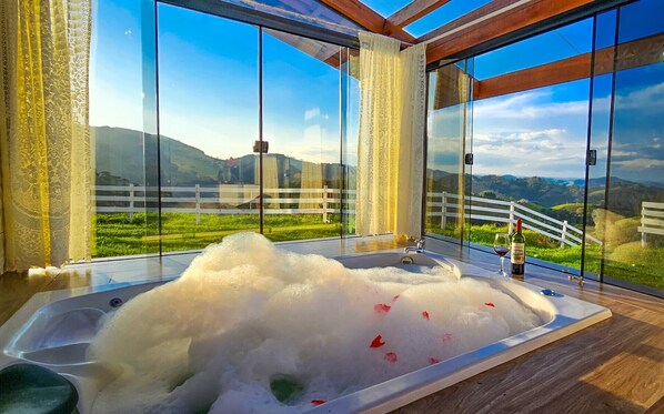 Deluxe Chalet, Balcony, Mountain View | Desk, laptop workspace, blackout drapes, iron/ironing board