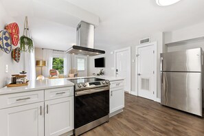 Private kitchen - QC Quarters Quadplex – Where Style, Privacy & Mild Bragging Rights Meet (Charlotte)