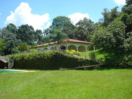 Exterior. Charming place, with a cozy single-story house.