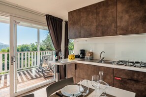 Fridge, stovetop, cookware/dishes/utensils