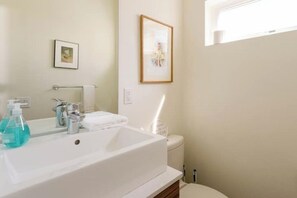 Hair dryer, towels, soap, toilet paper