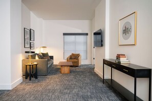 Suite Premier, varias camas | Caja fuerte, cortinas opacas, tabla de planchar con plancha