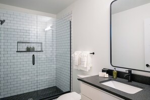 Hair dryer, bathrobes, towels, soap