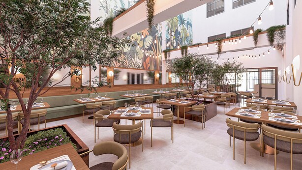 A spacious restaurant with multiple dining areas, green seating, and a mural of tropical plants on the wall. - The Promissory Hotel (Roanoke)