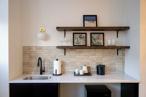 Suite Premier, varias camas | Caja fuerte, cortinas opacas, tabla de planchar con plancha