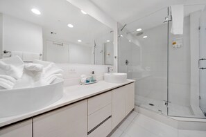 Shower, hair dryer, towels, soap
