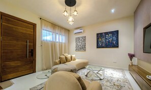 Apartment, Roll-in Shower, Balcony | Living area