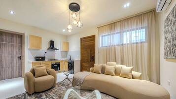 Apartment, Roll-in Shower, Balcony | Living area