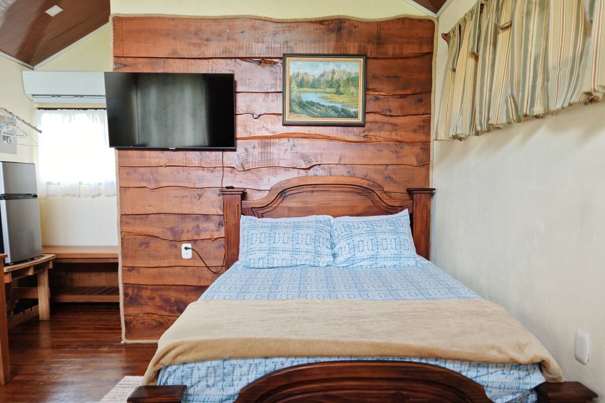 Chambre Quadruple Confort, patio, vue jardin