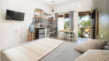 Premium bedding, desk, laptop workspace, free WiFi