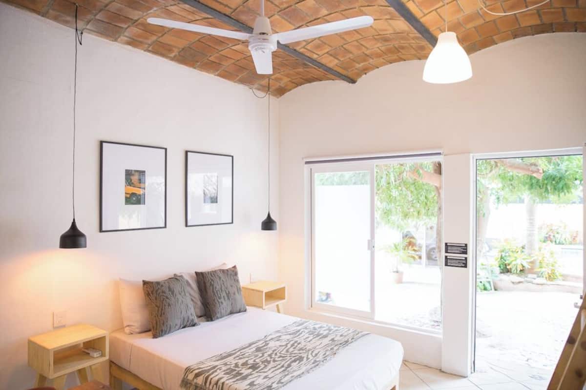 Premium bedding, desk, laptop workspace, free WiFi