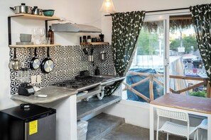 Comfort Studio, Balcony, Pool View | Private kitchen | Fridge, cookware/dishes/utensils