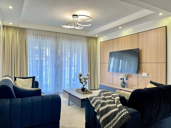 TV, fireplace - Elegant 3BR Apartment at 108 Riverside Drive (Nairobi)