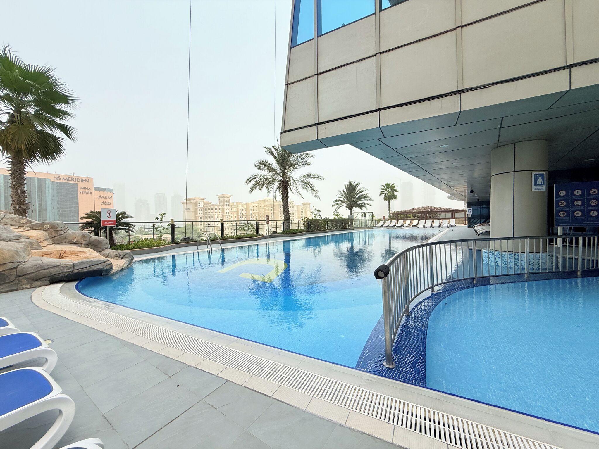 2 outdoor pools, pool umbrellas, pool loungers